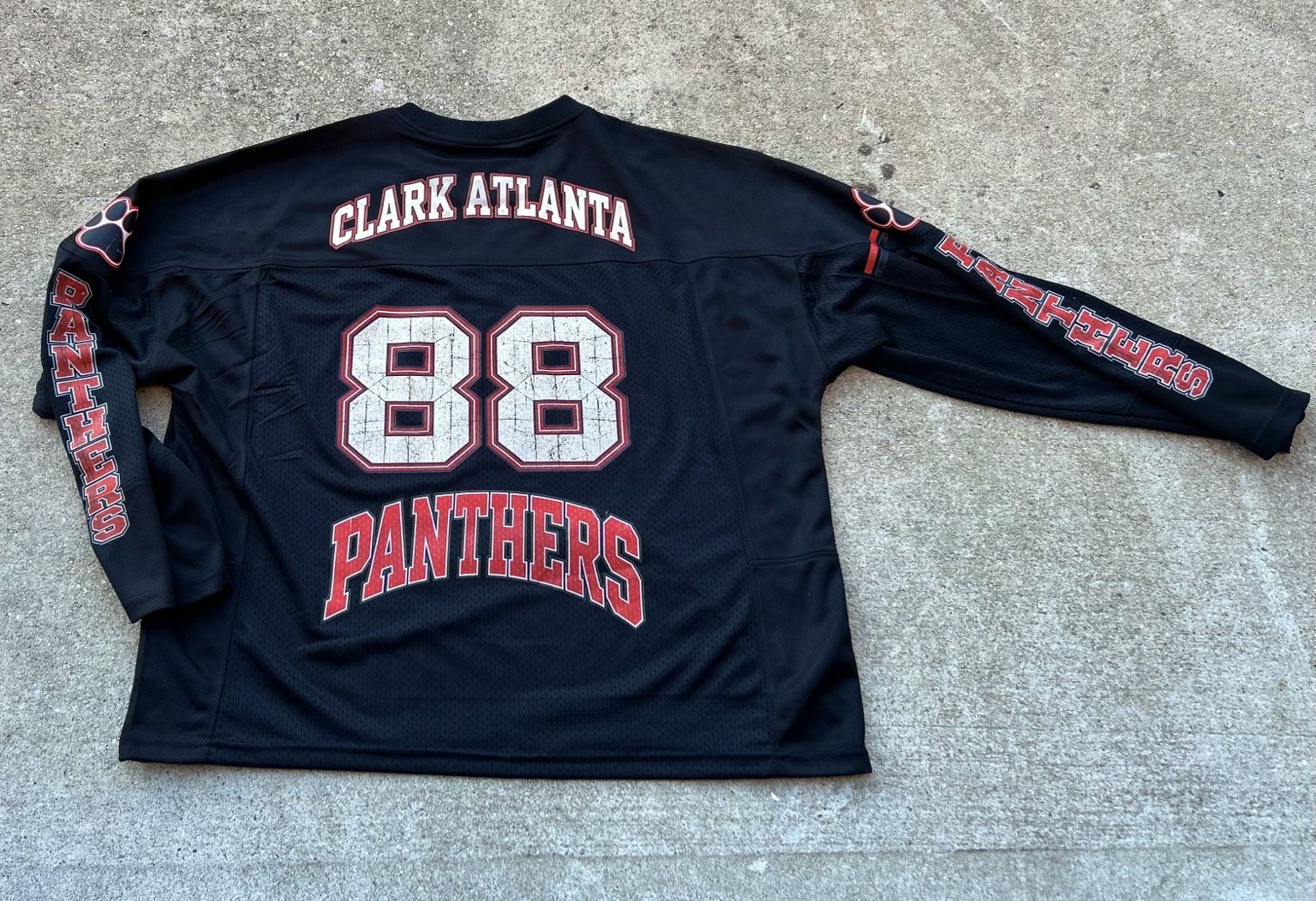 Back of Clark Atlanta long sleeve football jersey with 88 and Panthers graphics