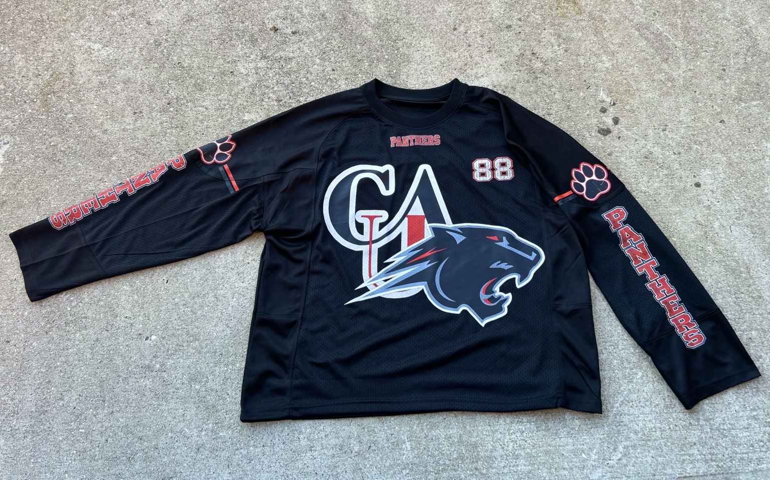 Front of black Clark Atlanta 88 long sleeve football jersey